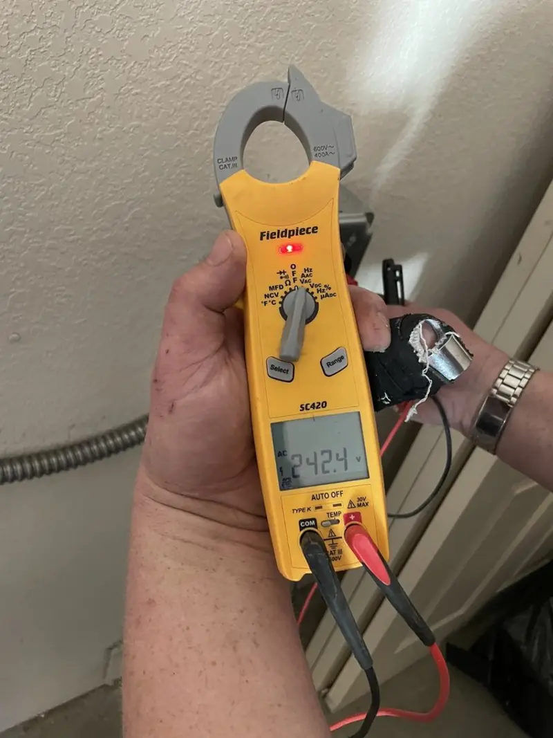 Voltage testing with clamp meter during Aluminum Wiring Replacement in Atmore